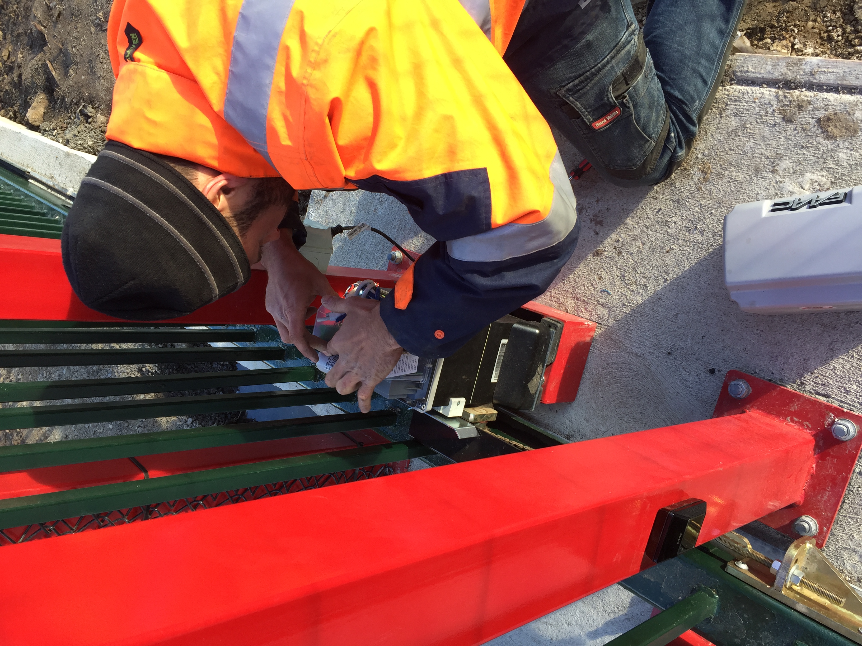 Gate Automation Systems technician servicing gate equipment